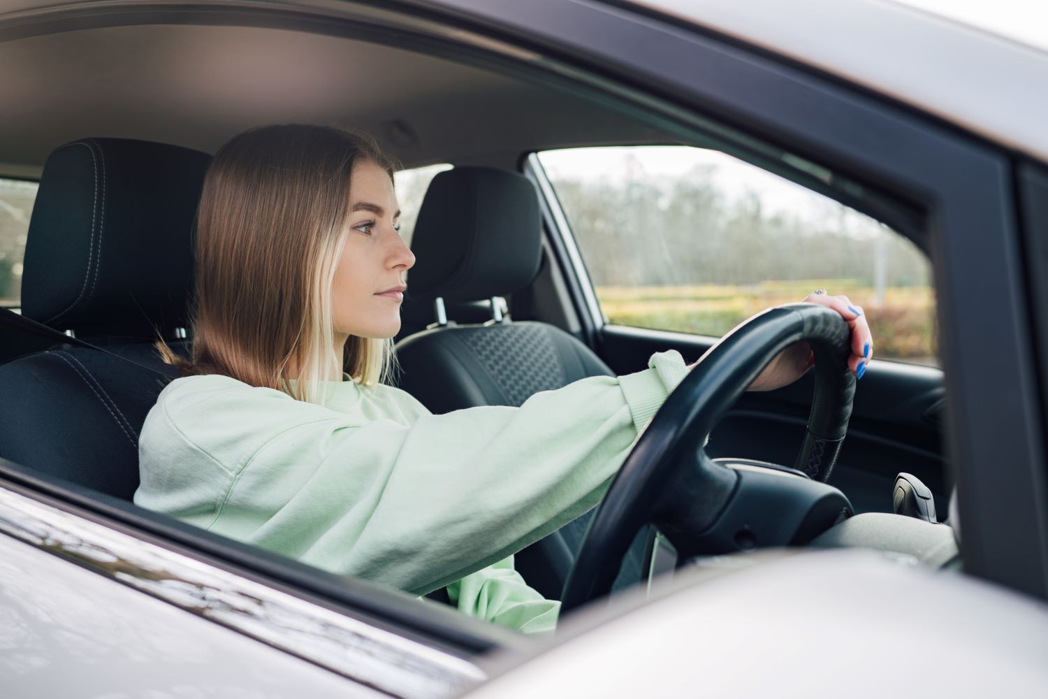 Young driver in the car